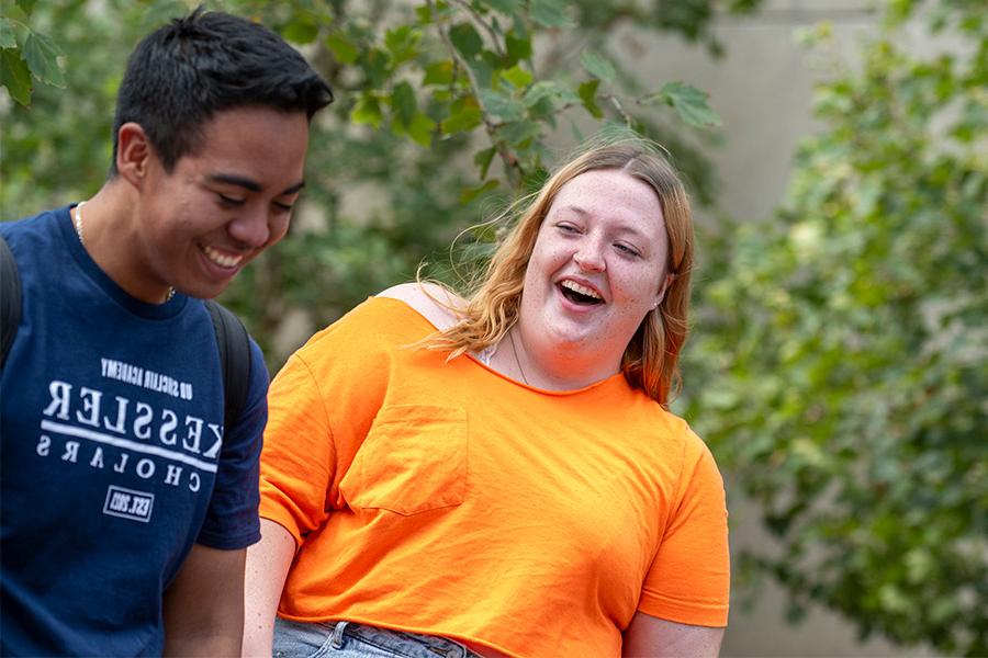 ${ Two Kessler Scholar students outside }